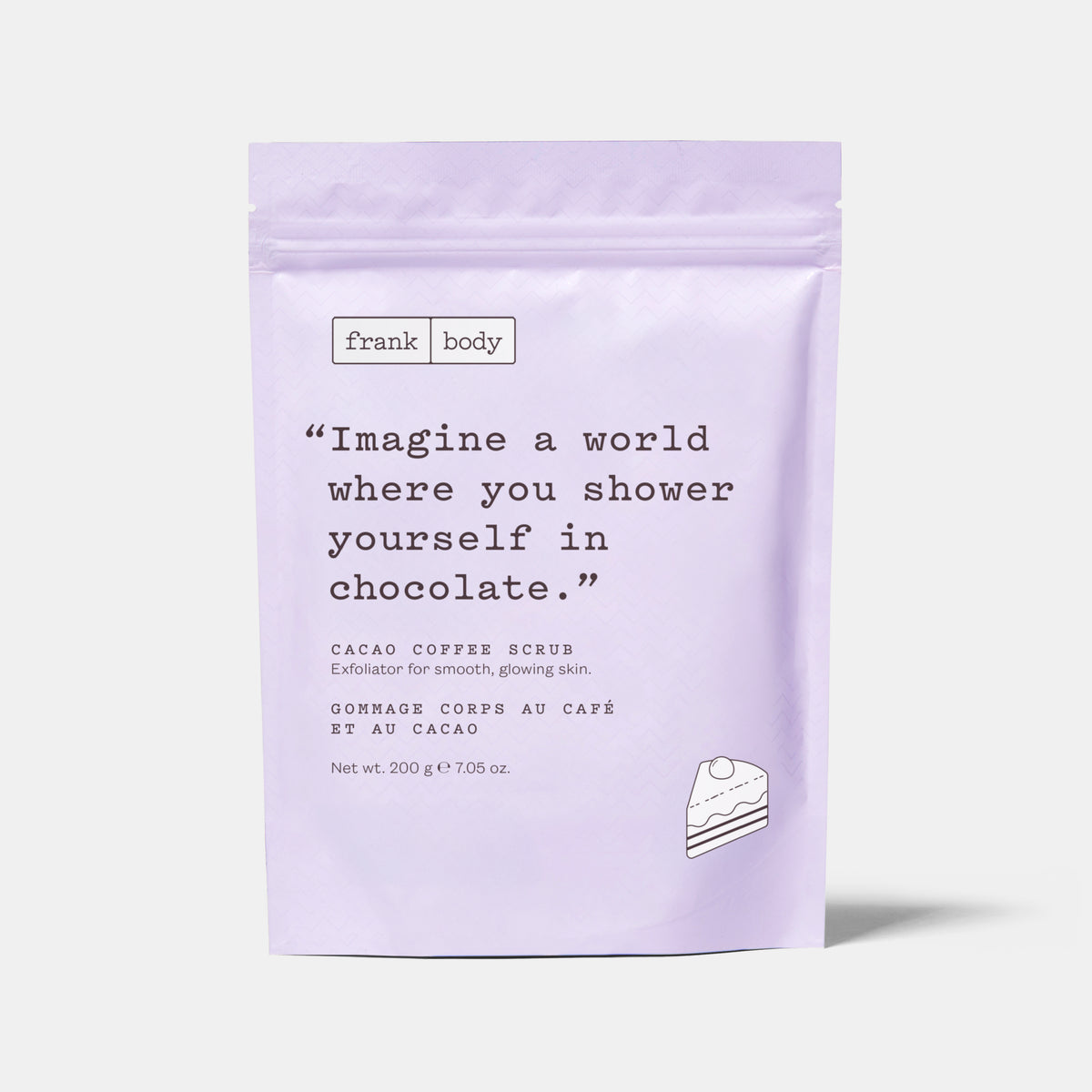 A light lavender stand-up pouch of Frank Body Cacao Coffee Scrub, featuring a quote on the front and a small cake illustration, set against a light gray background.